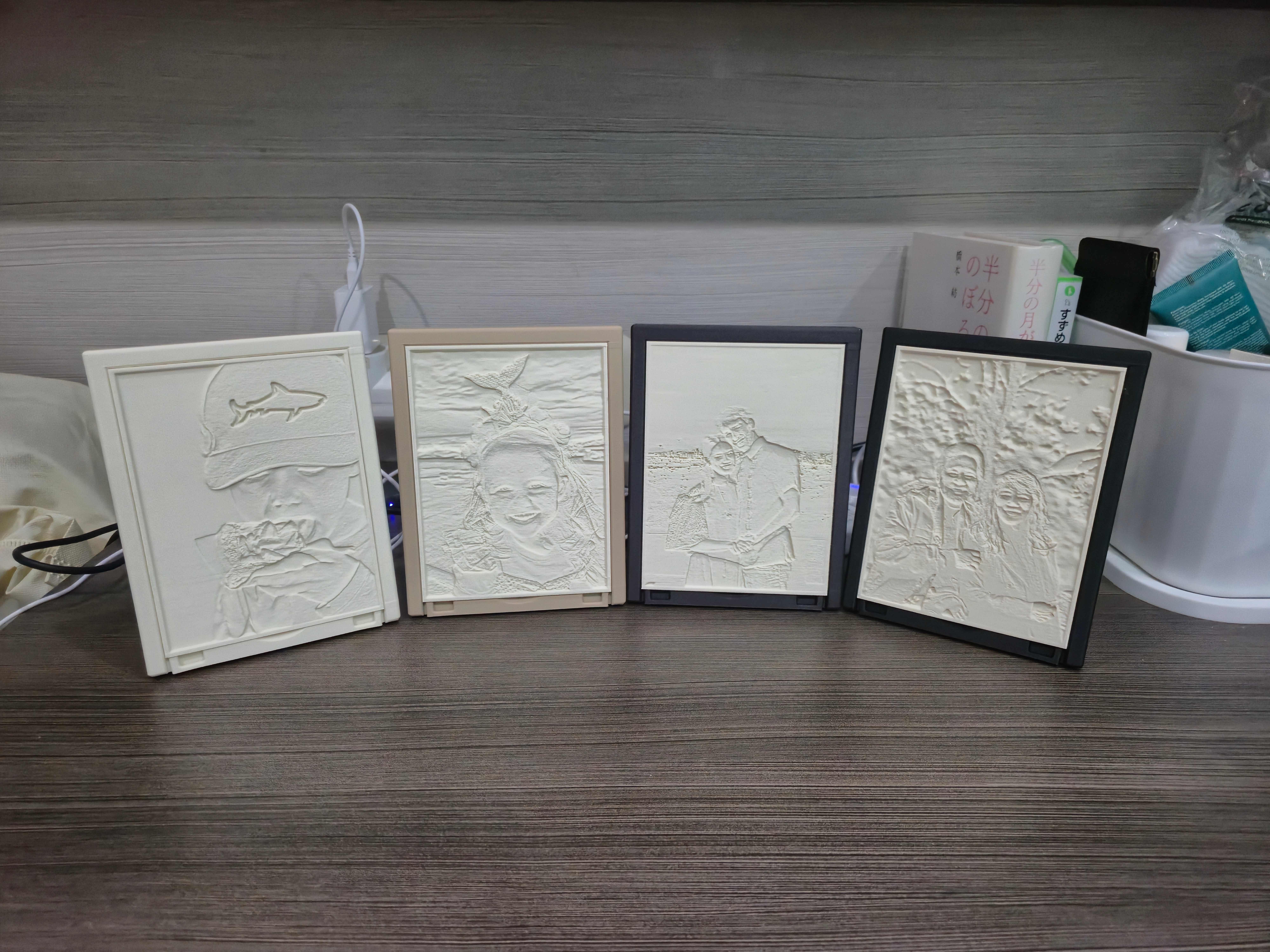 Four Lume lamps showing 3D-etched details in daylight